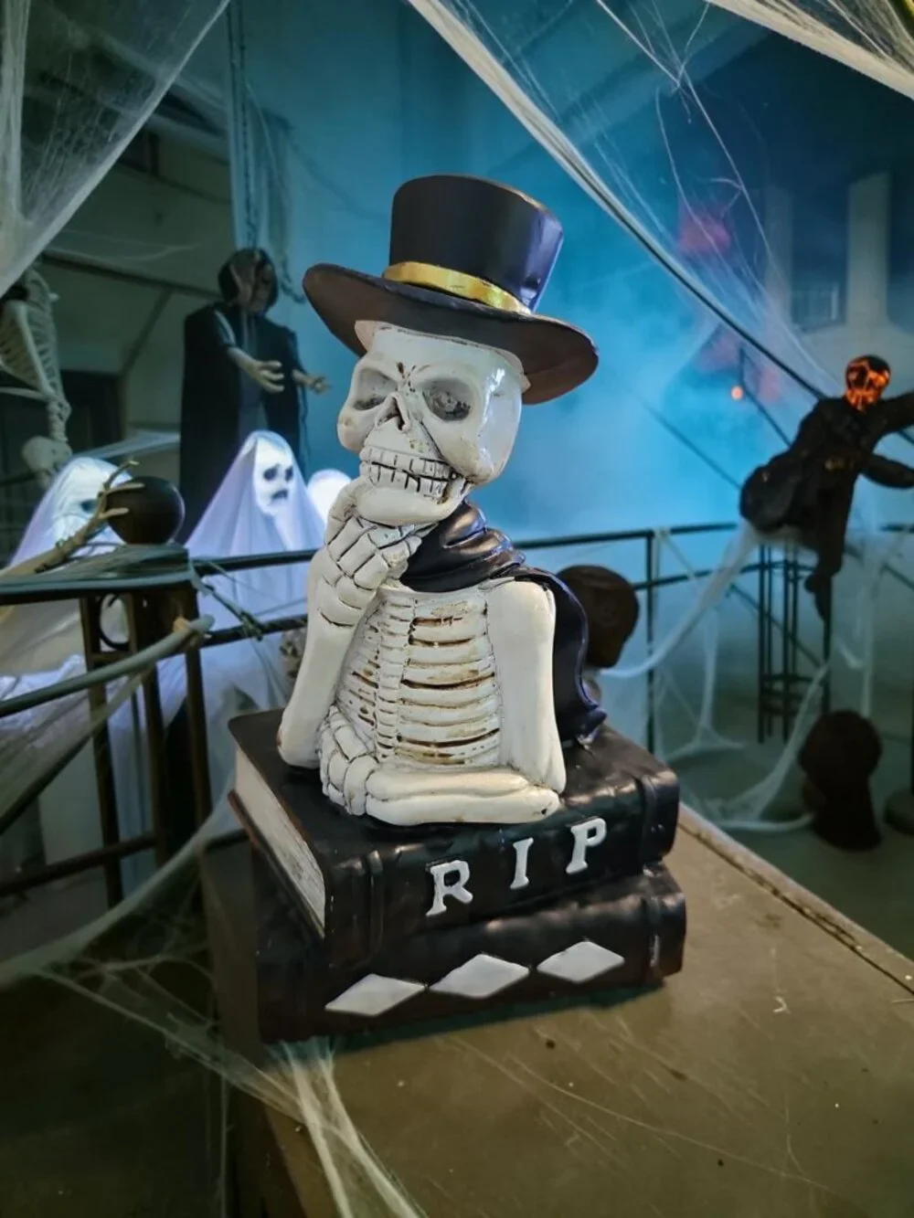 Spooky Book Tabletop Décor – Skeleton Figurine on RIP Book – Halloween Seasonal